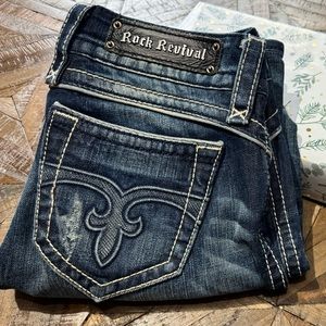 Women’s Rock Revival blue jeans, size 26, factory distressed, bootcut